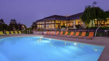 Outdoor pool, open 9:00 AM to 9:00 PM, pool umbrellas, pool loungers