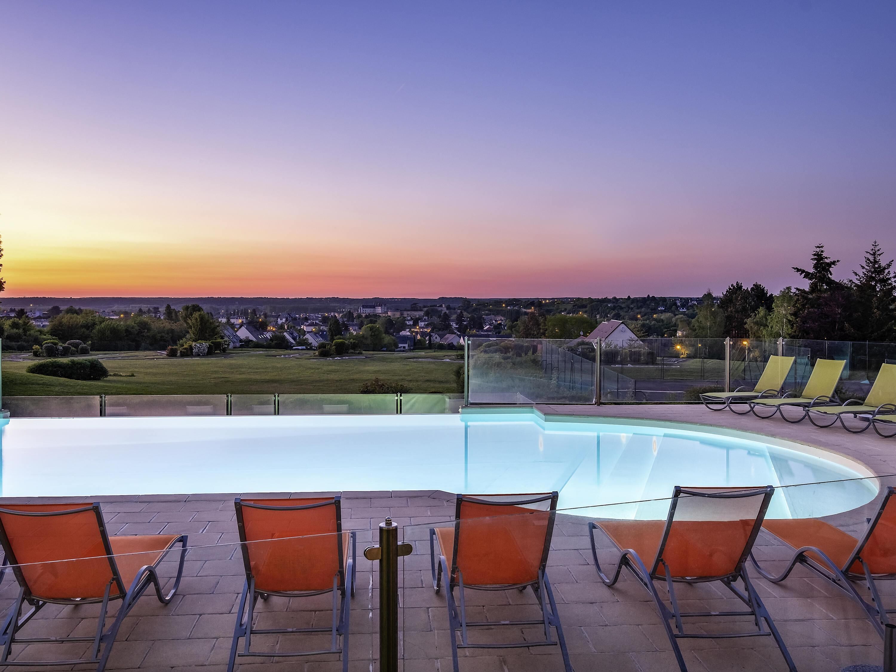 Outdoor pool, open 9:00 AM to 9:00 PM, pool umbrellas, sun loungers