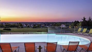 Outdoor pool, open 9:00 AM to 9:00 PM, pool umbrellas, sun loungers