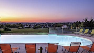 Outdoor pool, open 9:00 AM to 9:00 PM, pool umbrellas, pool loungers