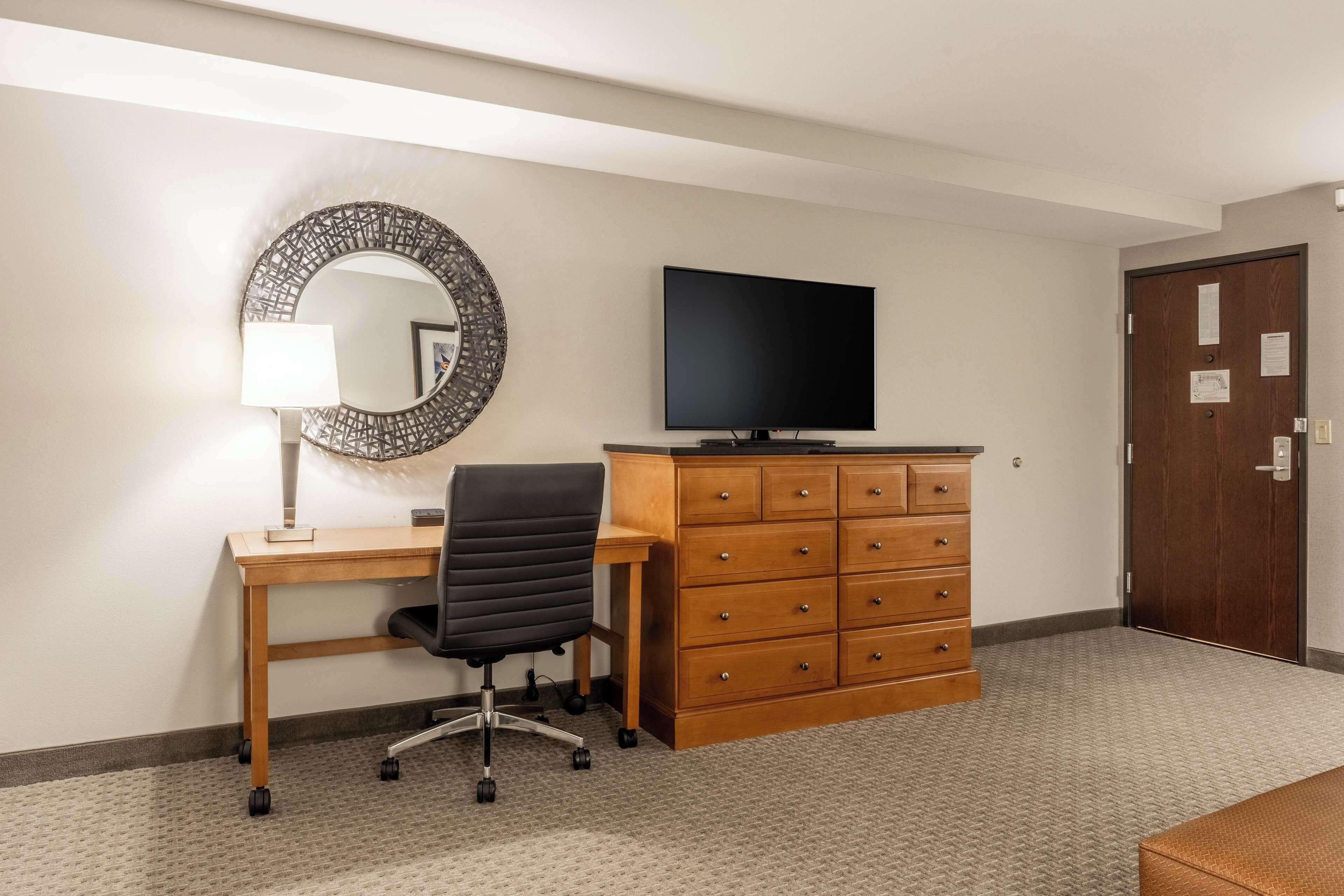 suite, 1 king bed with sofa bed, accessible, refrigerator & microwave (2 rooms, roll in shower) | 1 bedroom, desk, blackout curtains, iron/ironing board