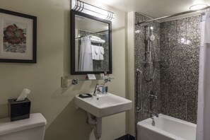 Combined shower/bathtub, hair dryer, towels