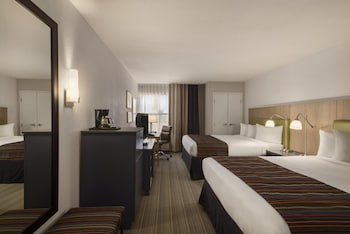 Standard Room, 2 Queen Beds | Desk, iron/ironing board, free WiFi, bed sheets at GreenTree Inn & Suites Phoenix Sky Harbor