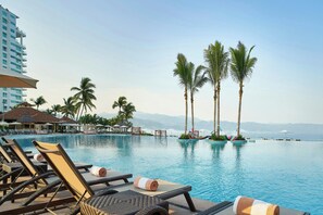 Indoor pool, outdoor pool, pool umbrellas