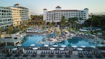 Indoor pool, outdoor pool, pool umbrellas