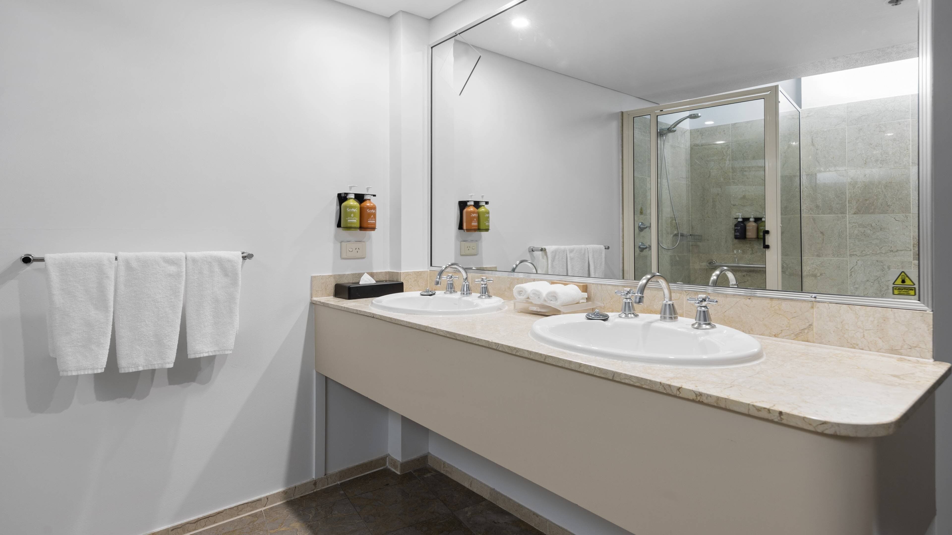 suite, 1 king bed | bathroom | combined shower/bathtub, free toiletries, hair dryer, towels
