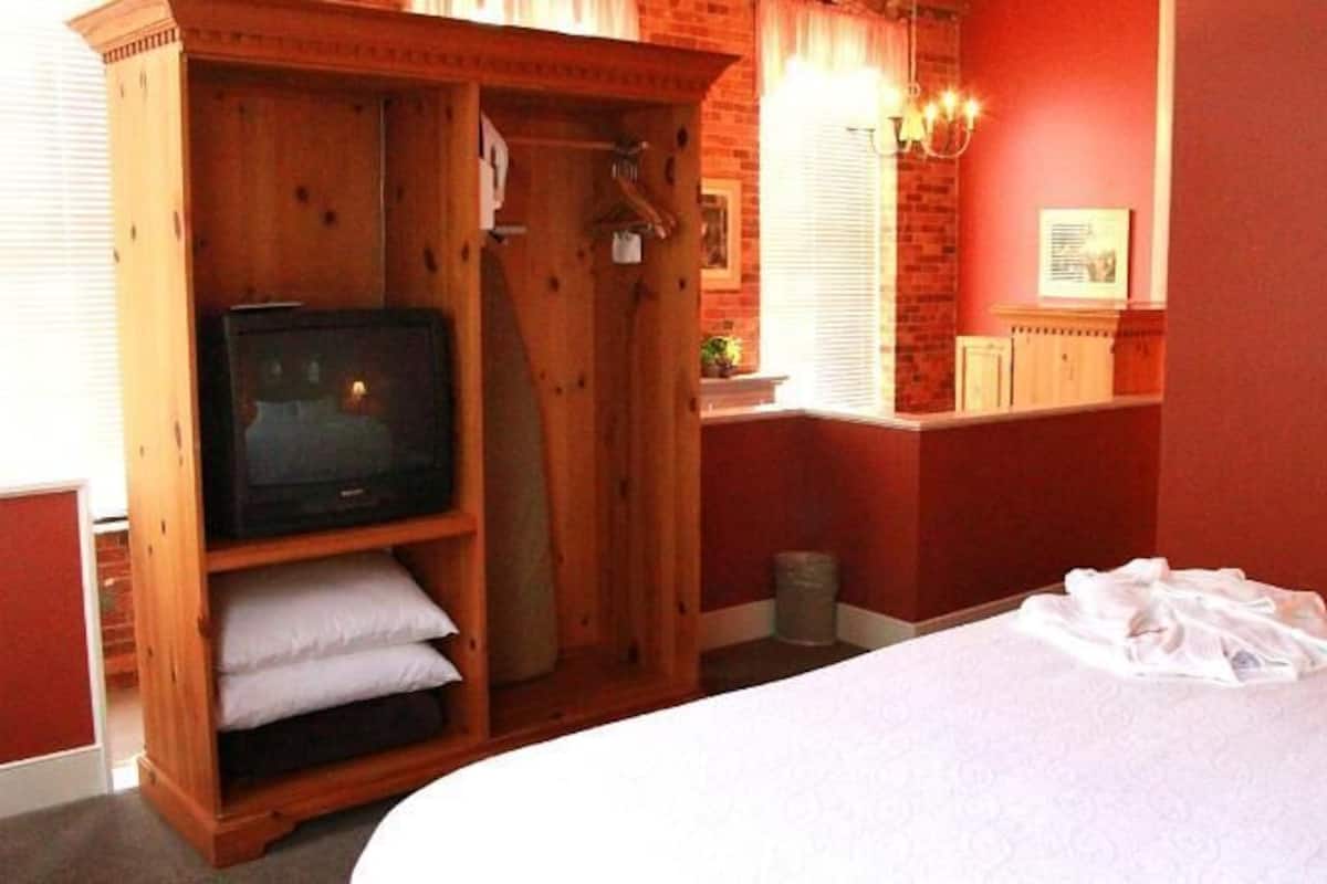 Premium bedding, desk, blackout curtains, iron/ironing board