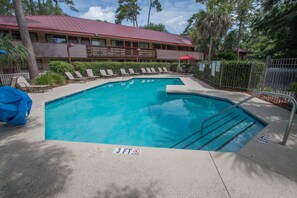 Seasonal outdoor pool, pool umbrellas, pool loungers