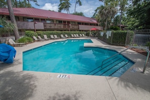 Seasonal outdoor pool, open 10:00 AM to 7:00 PM, pool umbrellas