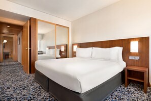 Suite, 1 King Bed, Non Smoking, River View | Minibar, in-room safe, desk, laptop workspace