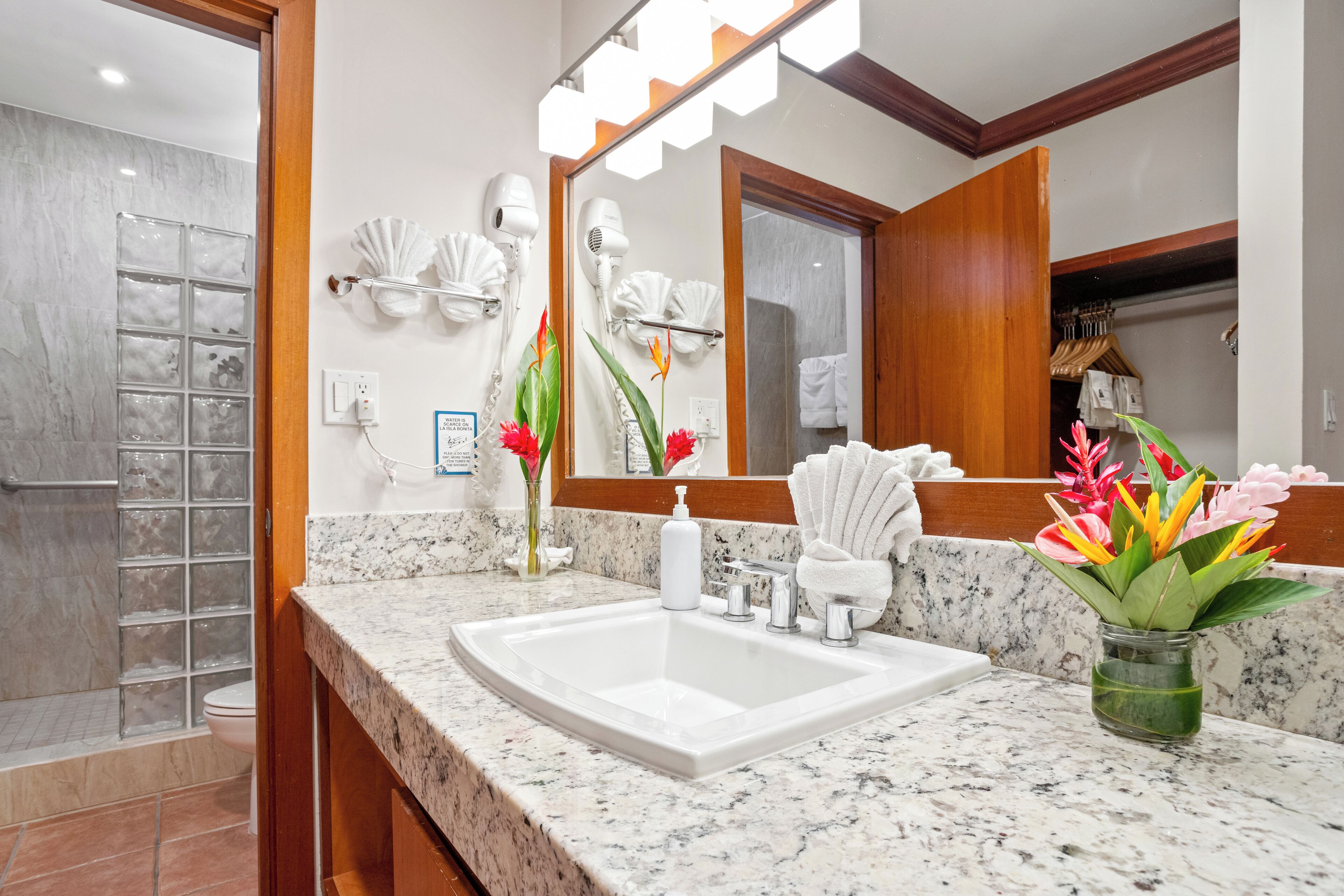 deluxe room, 2 double beds | bathroom | shower, hair dryer, towels