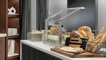 Daily buffet breakfast (USD 24 per person)