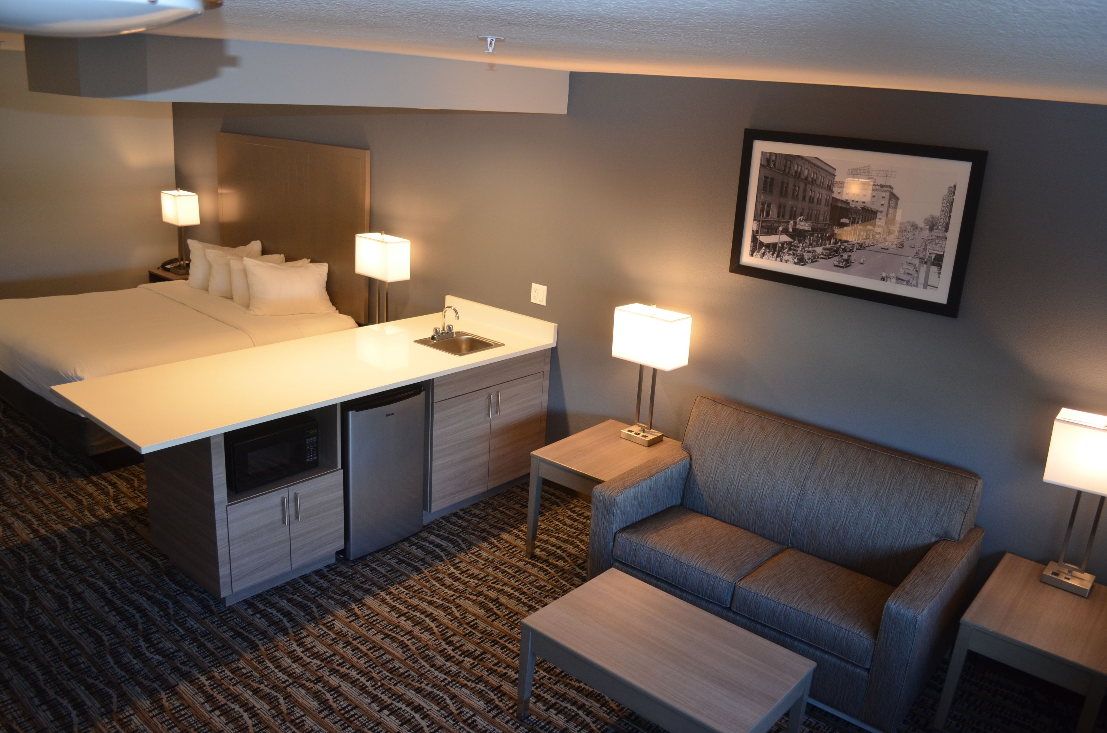 Laptop workspace, blackout drapes, iron/ironing board