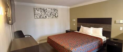 Habitación estándar, 1 cama King size | Área de sala de estar | Televisión LED