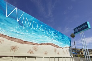 Outdoor pool, open 9:00 AM to 10:00 PM, pool umbrellas, pool loungers