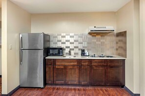 Suite, 1 King Bed, Non Smoking, Kitchenette (Living Room;with Sofabed) | 1 bedroom, desk, laptop workspace, iron/ironing board