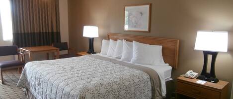Deluxe Room, 1 King Bed, Non Smoking | Iron/ironing board, rollaway beds, free WiFi, bed sheets