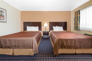 Coffres-forts dans les chambres, bureau, fer et planche à repasser