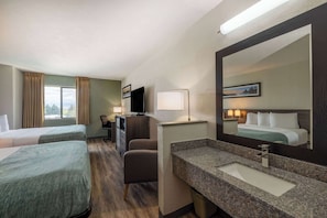 Room, 2 Queen Beds, Non Smoking | Bathroom | Hydromassage showerhead, designer toiletries, hair dryer, towels