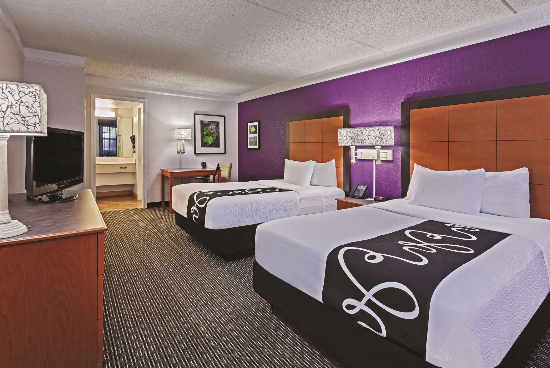 Premium bedding, pillowtop beds, desk, blackout drapes