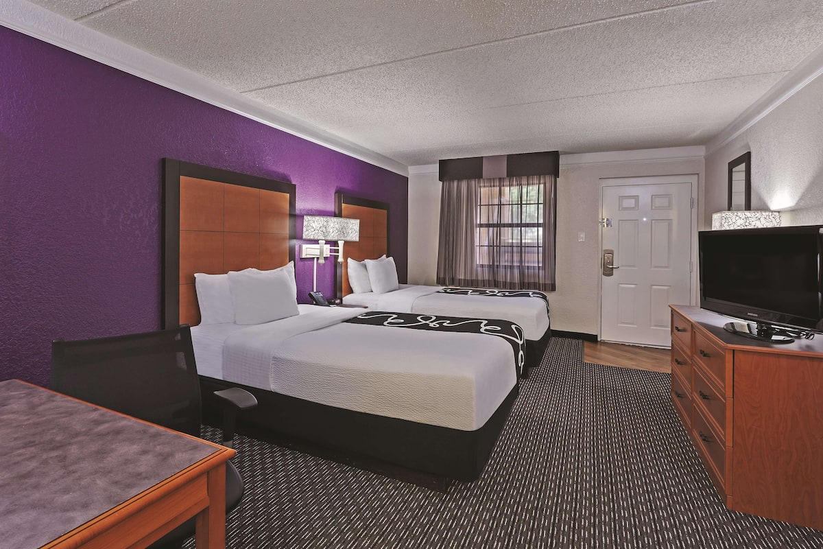 Premium bedding, pillow-top beds, desk, blackout curtains
