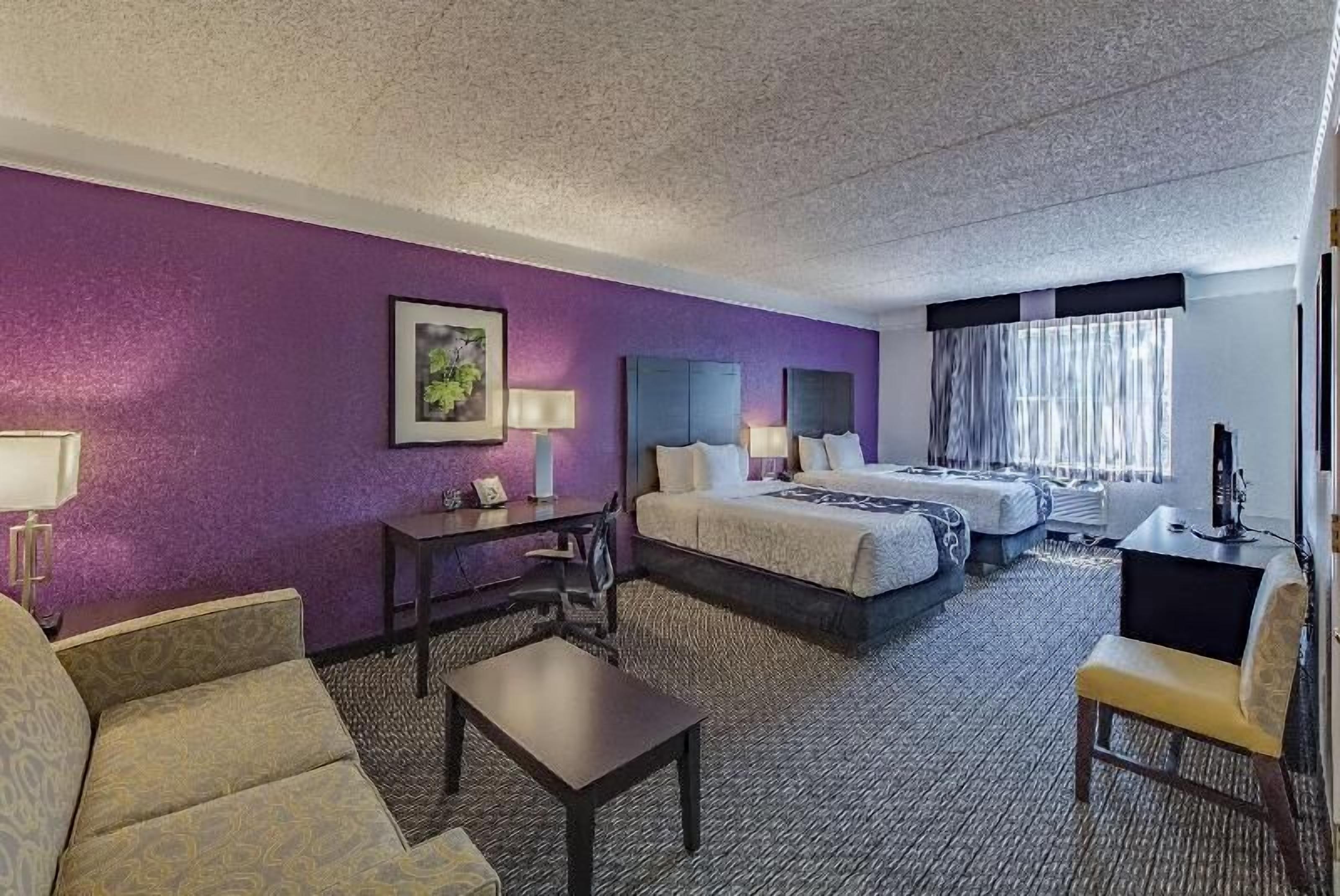 Premium bedding, pillowtop beds, desk, blackout drapes