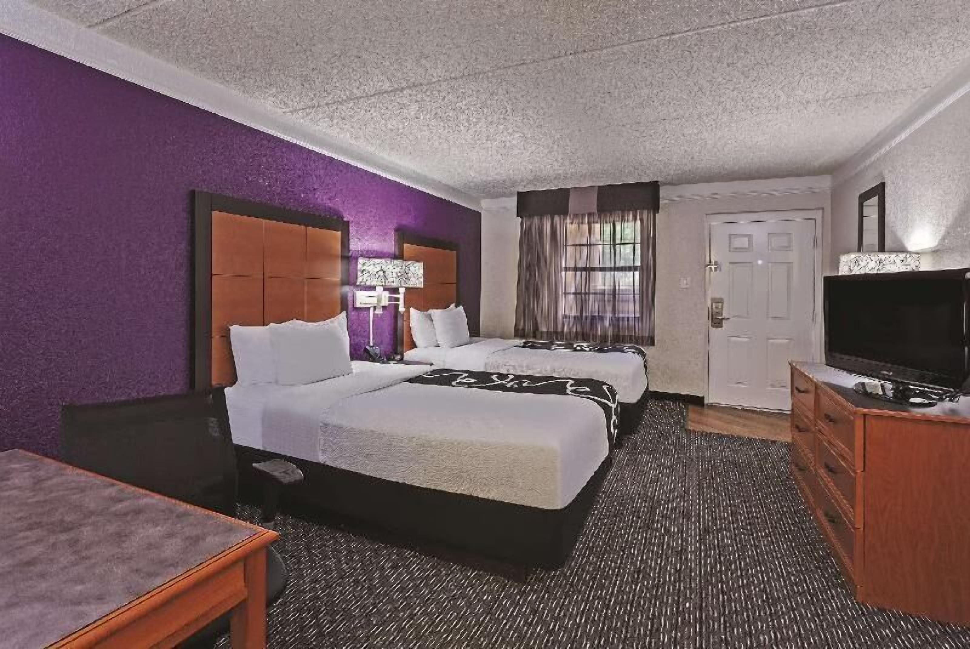 Premium bedding, pillowtop beds, desk, blackout drapes