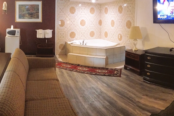 Suite, 1 King Bed, Non Smoking | Desk, iron/ironing board (on request), cribs (free)