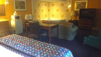 Suite, 1 King Bed, Non Smoking | Desk, iron/ironing board, free cribs/infant beds, rollaway beds