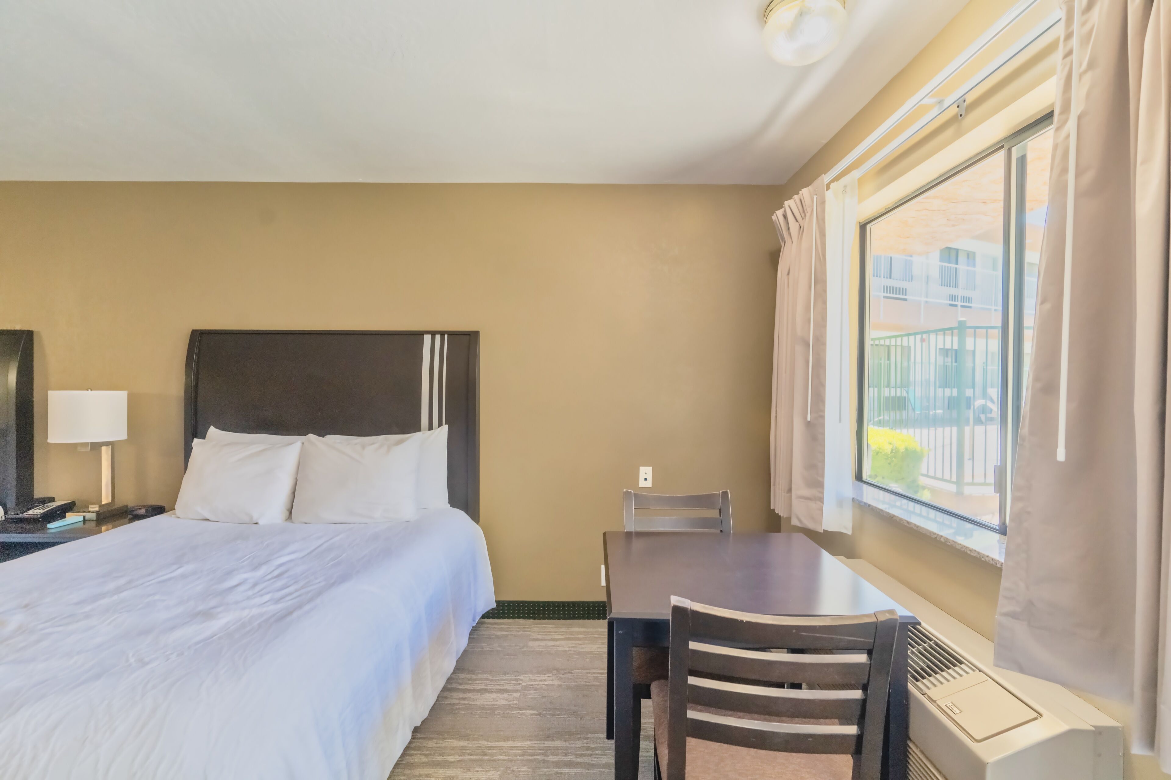 deluxe quadruple room, 2 queen beds, non smoking | iron/ironing board, free wifi, bed sheets