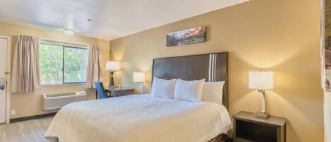 Tabla de planchar con plancha, wifi gratis, ropa de cama