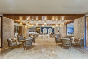 3 bars/lounges, poolside bar, beach bar
