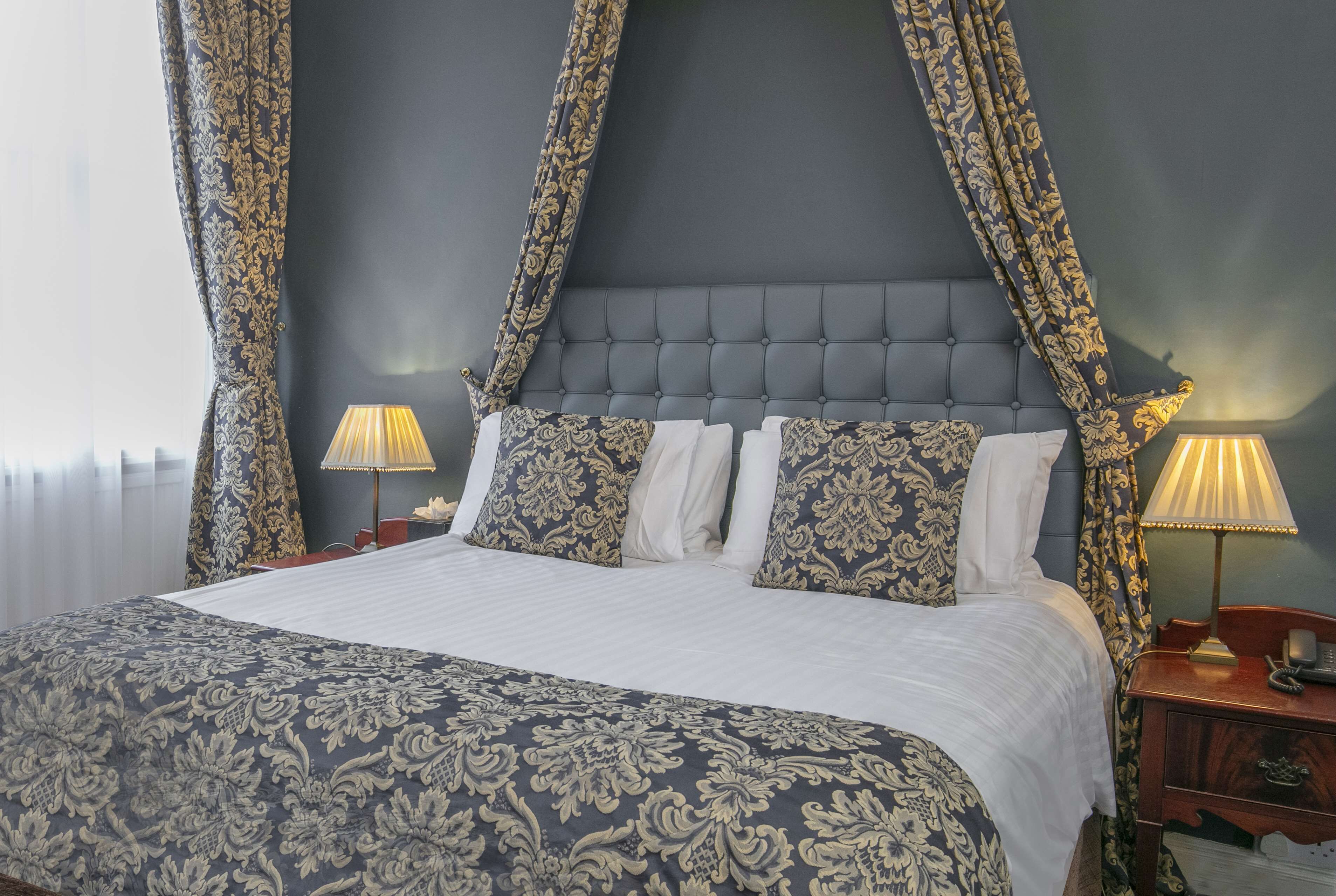 superior room, 1 double bed, non smoking | premium bedding, desk, blackout curtains, iron/ironing board