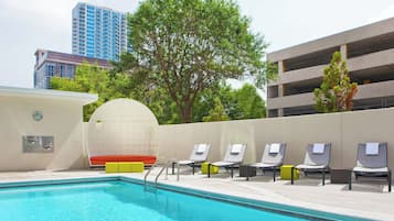 Outdoor pool, open 10:00 AM to 10:00 PM, sun loungers
