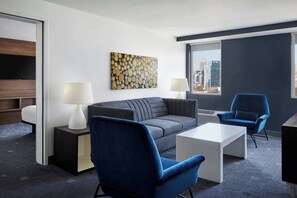 Suite, 1 Bedroom, City View | Living room | 42-inch LCD TV with cable channels, TV