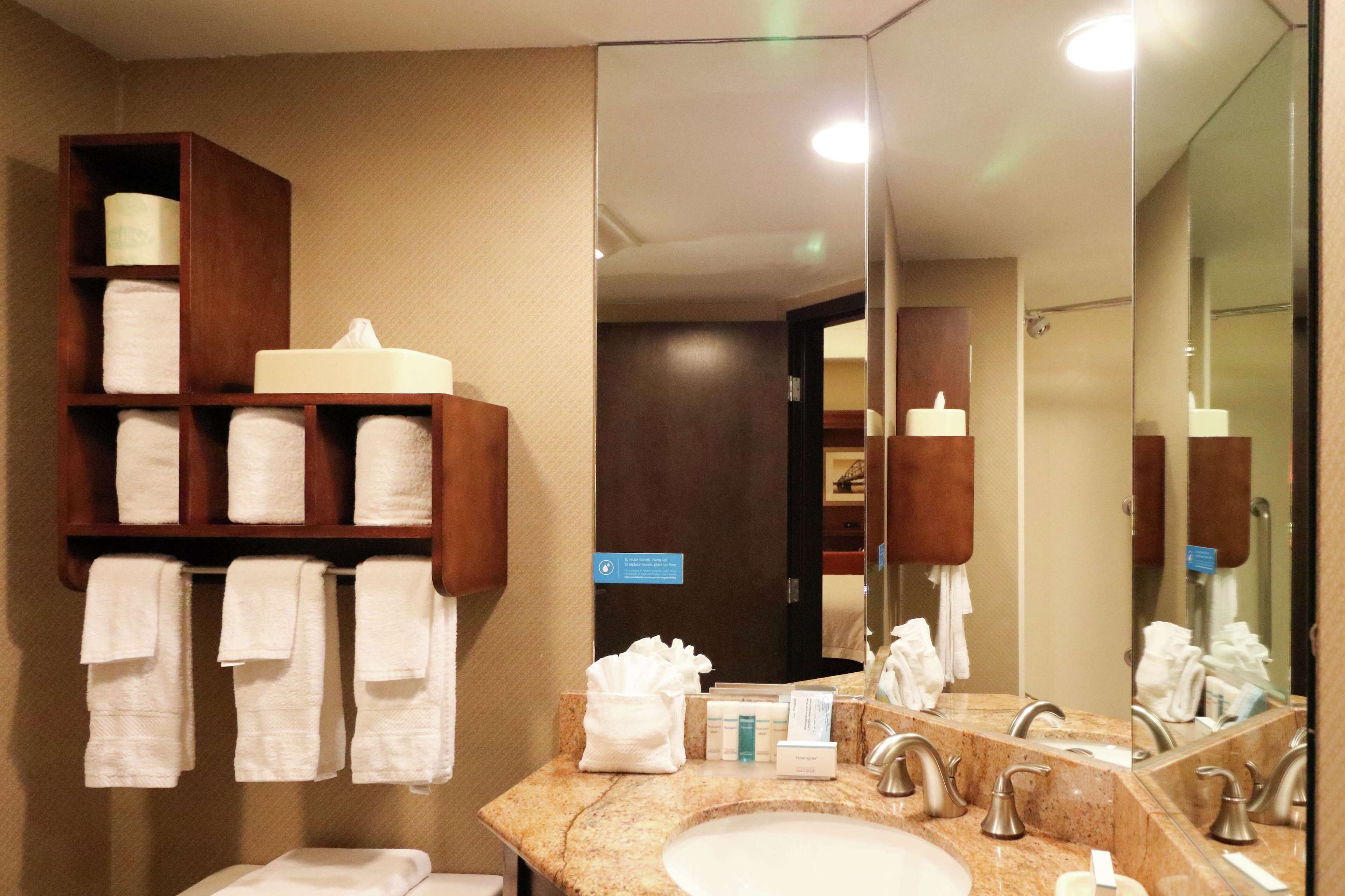 room, 1 king bed with sofa bed (study) | bathroom | free toiletries, hair dryer, towels