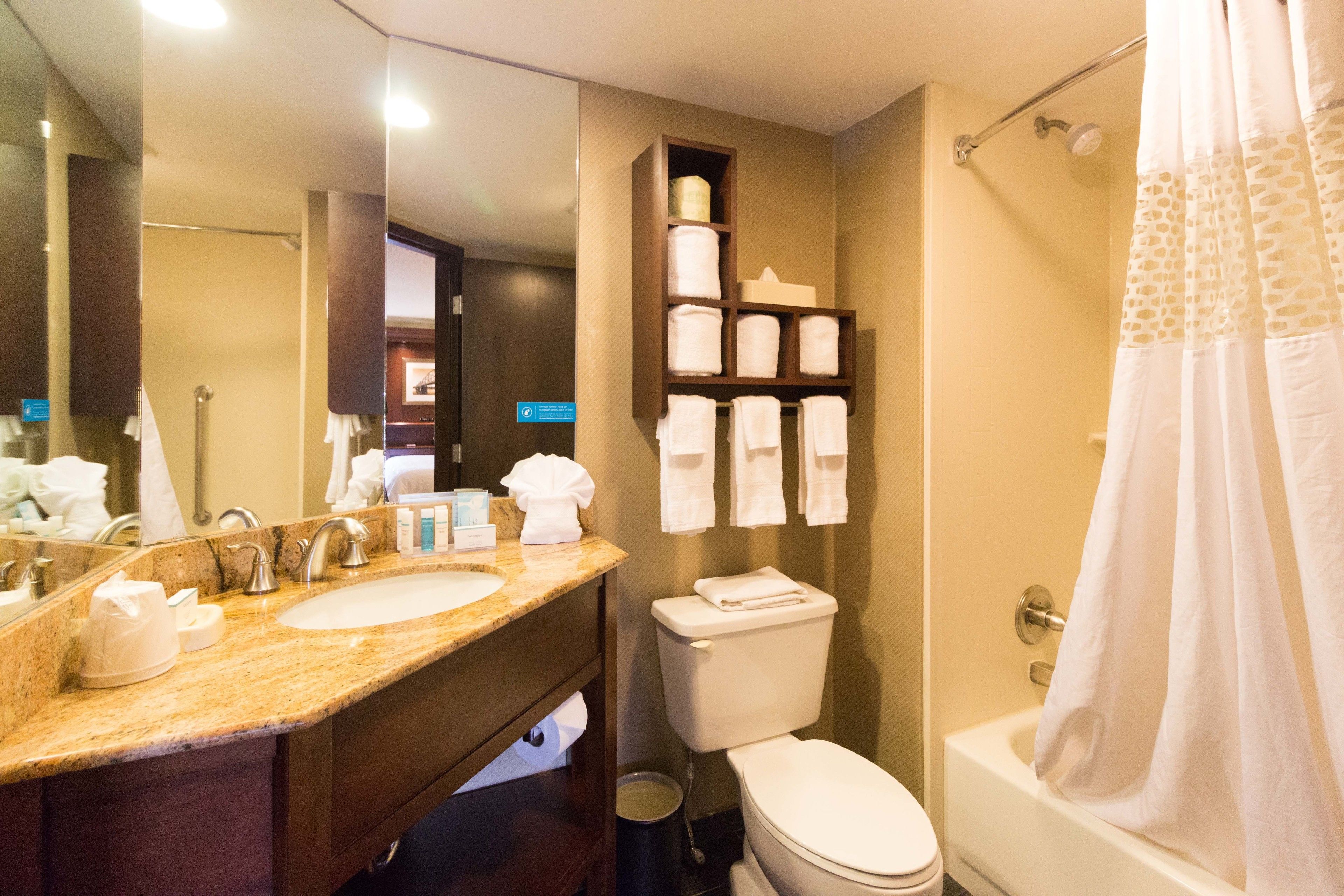 room, 1 king bed with sofa bed (study) | bathroom | free toiletries, hair dryer, towels