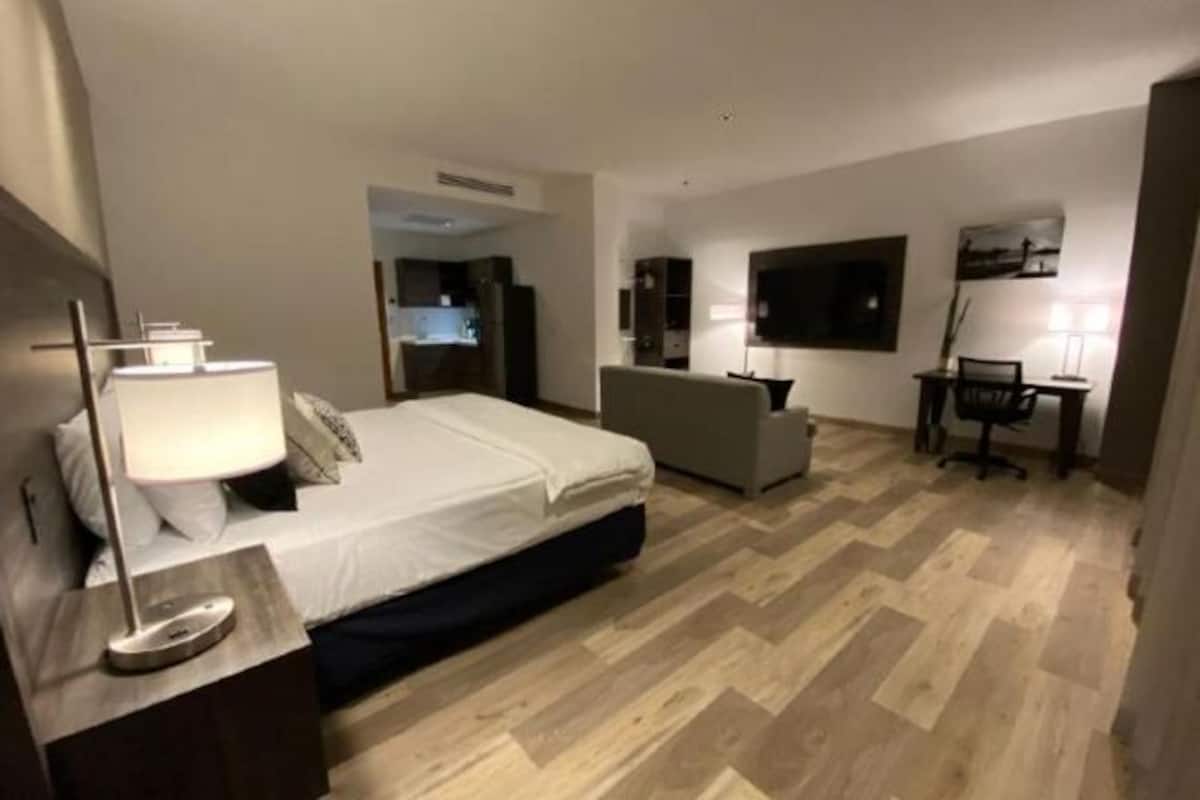 In-room safe, desk, laptop workspace, blackout curtains