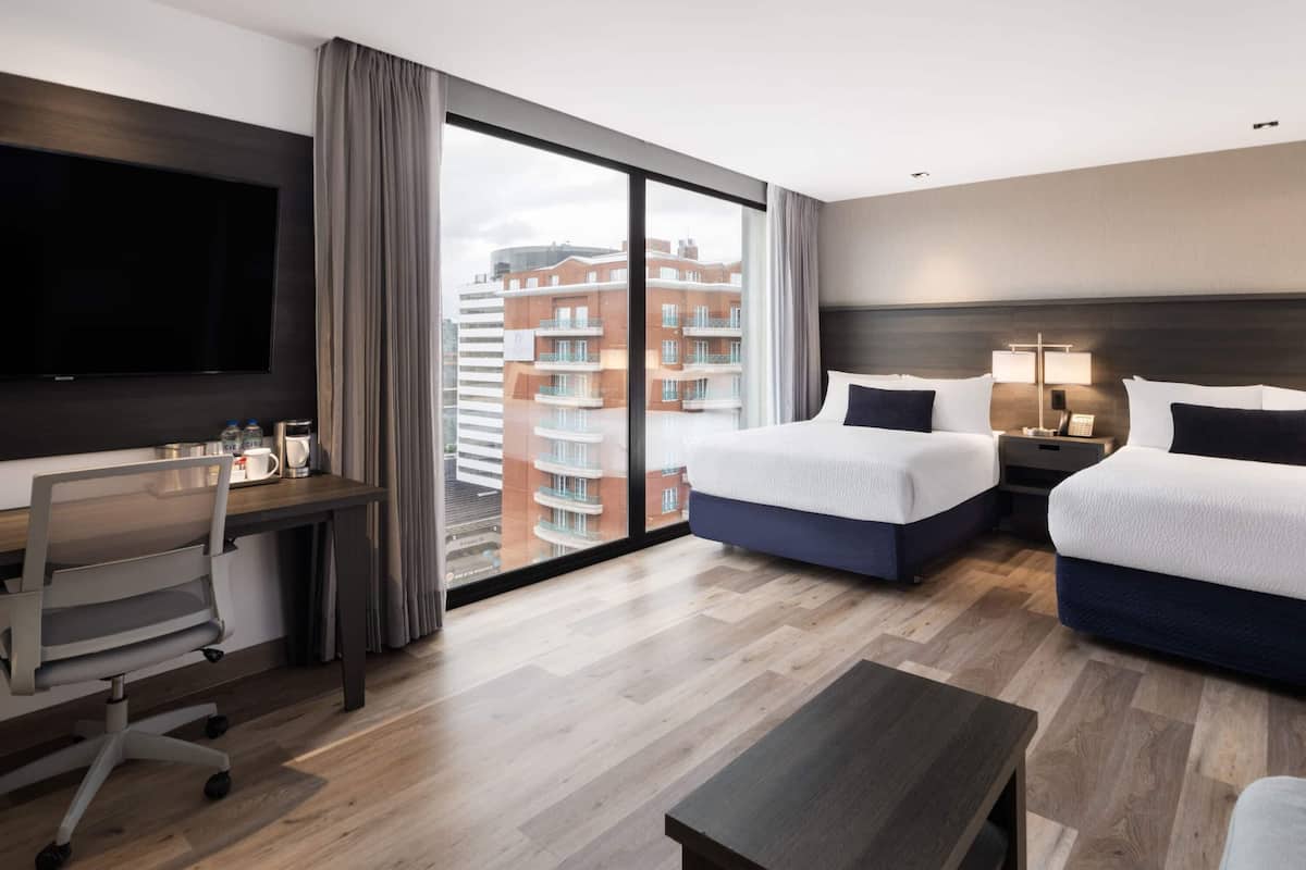 2 Queen Bed, One Bedroom | In-room safe, desk, laptop workspace, blackout drapes