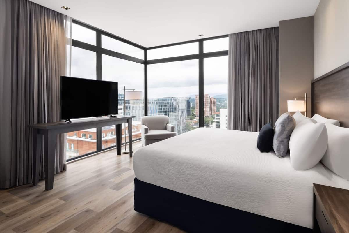 Business, 1 King Studio One Bedroom Suite | In-room safe, desk, laptop workspace, blackout drapes