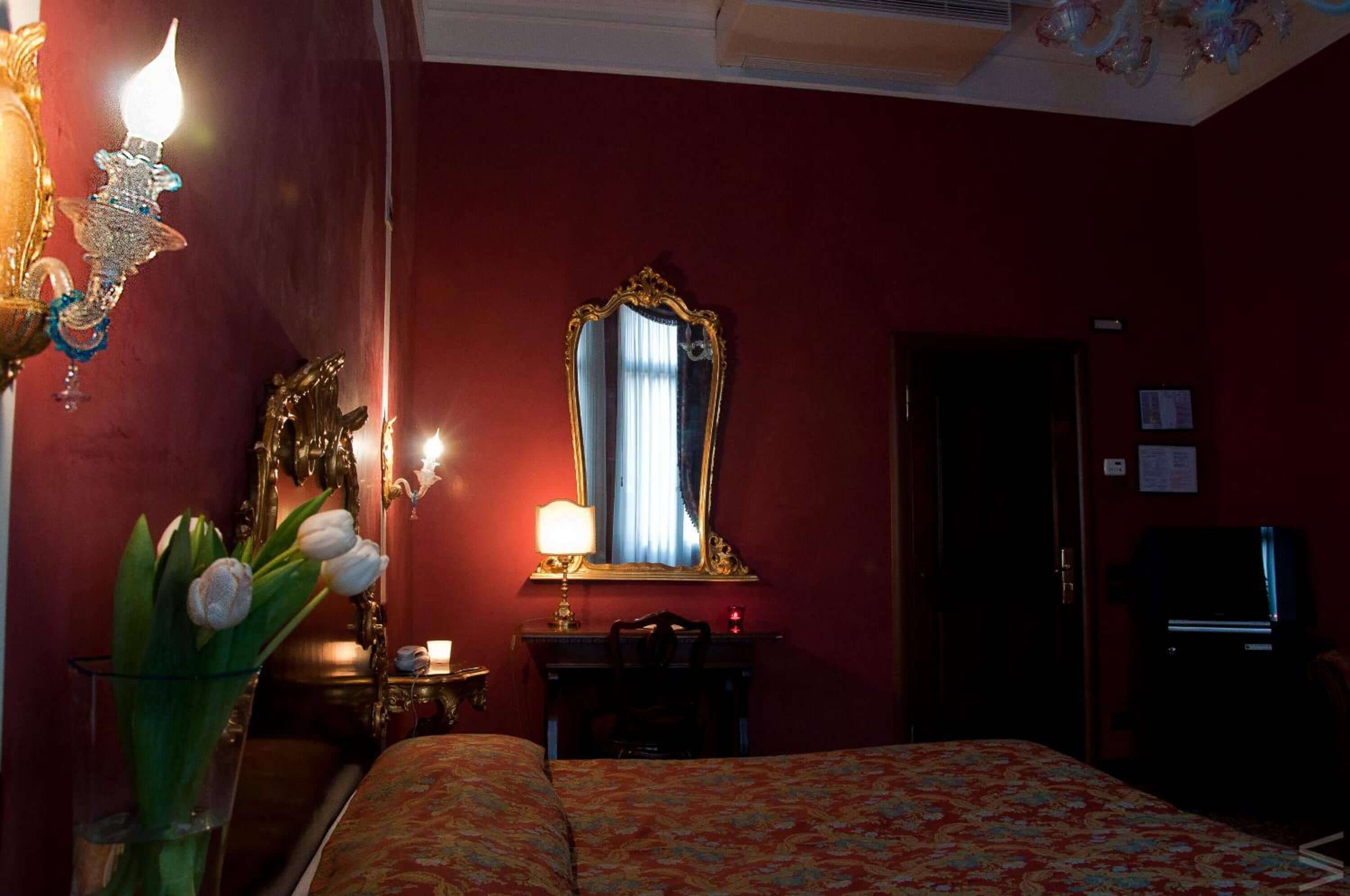 grand double room, canal view | minibar, in-room safe, desk, blackout curtains