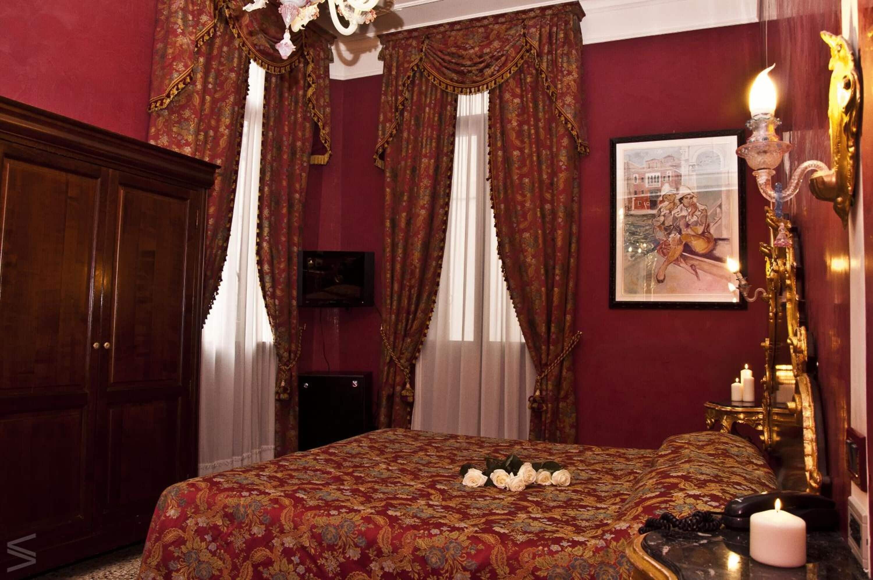 grand double room, canal view | minibar, in-room safe, desk, blackout curtains