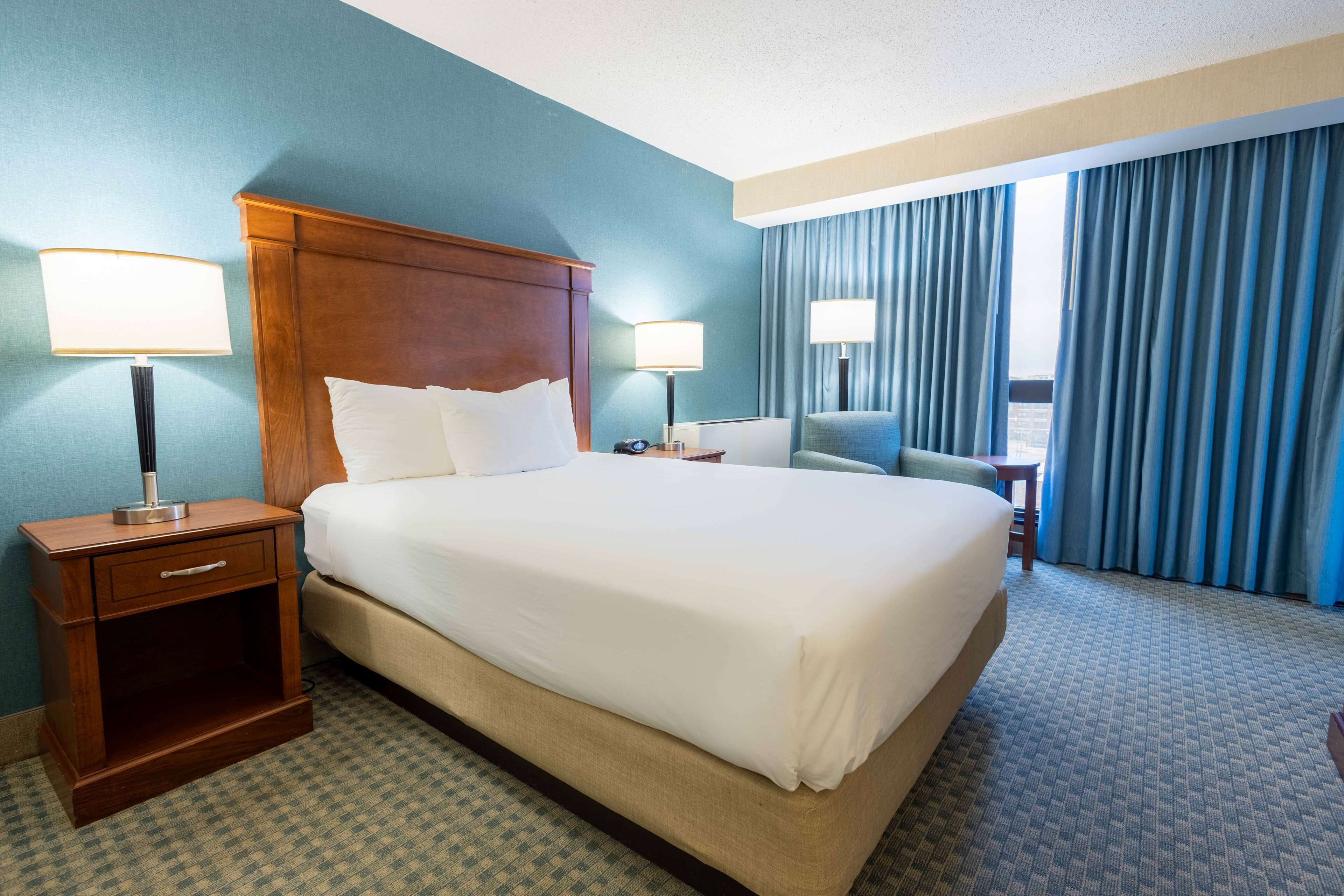 Desk, blackout drapes, iron/ironing board, free cribs/infant beds