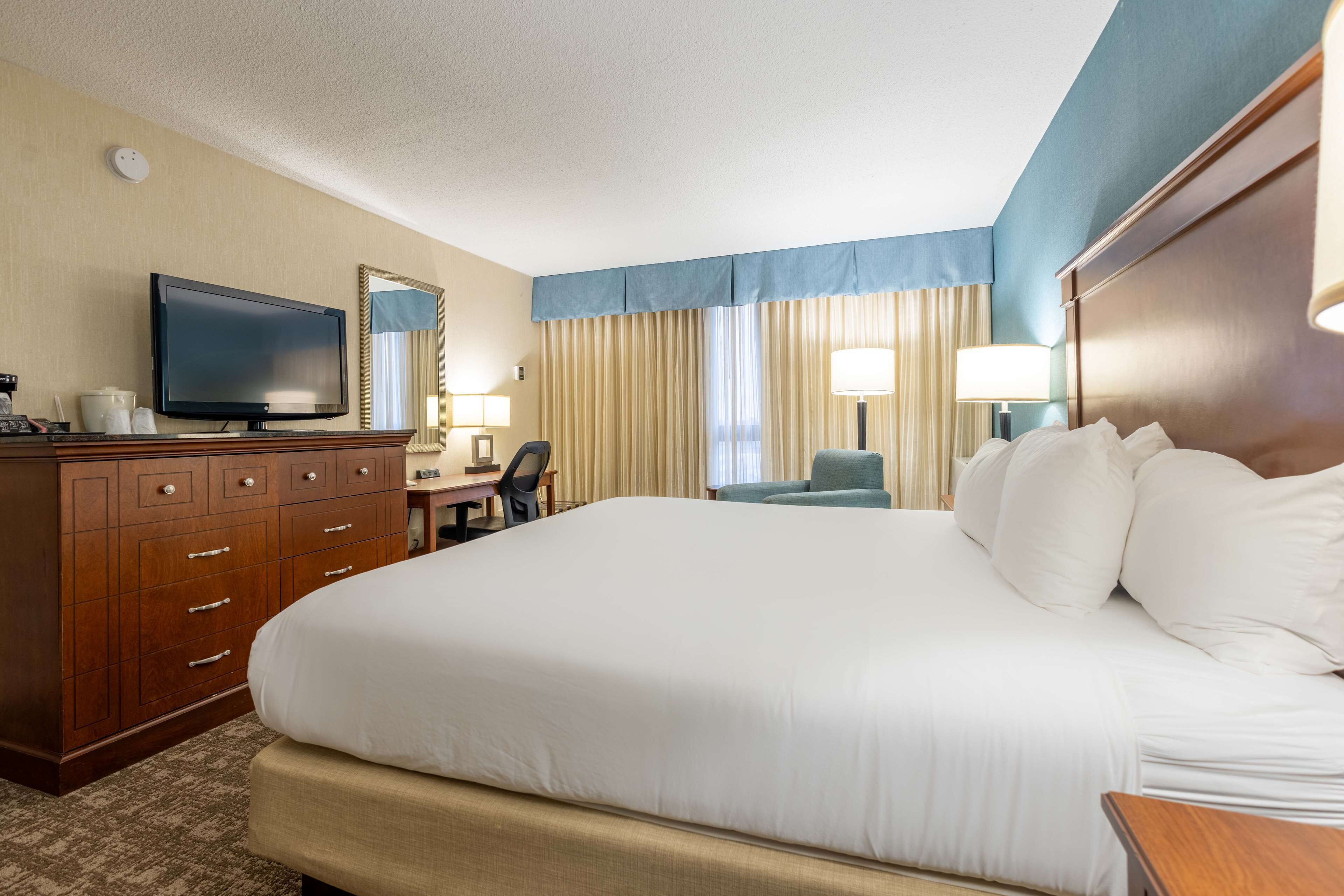 desk, blackout curtains, iron/ironing board, free cots/infant beds