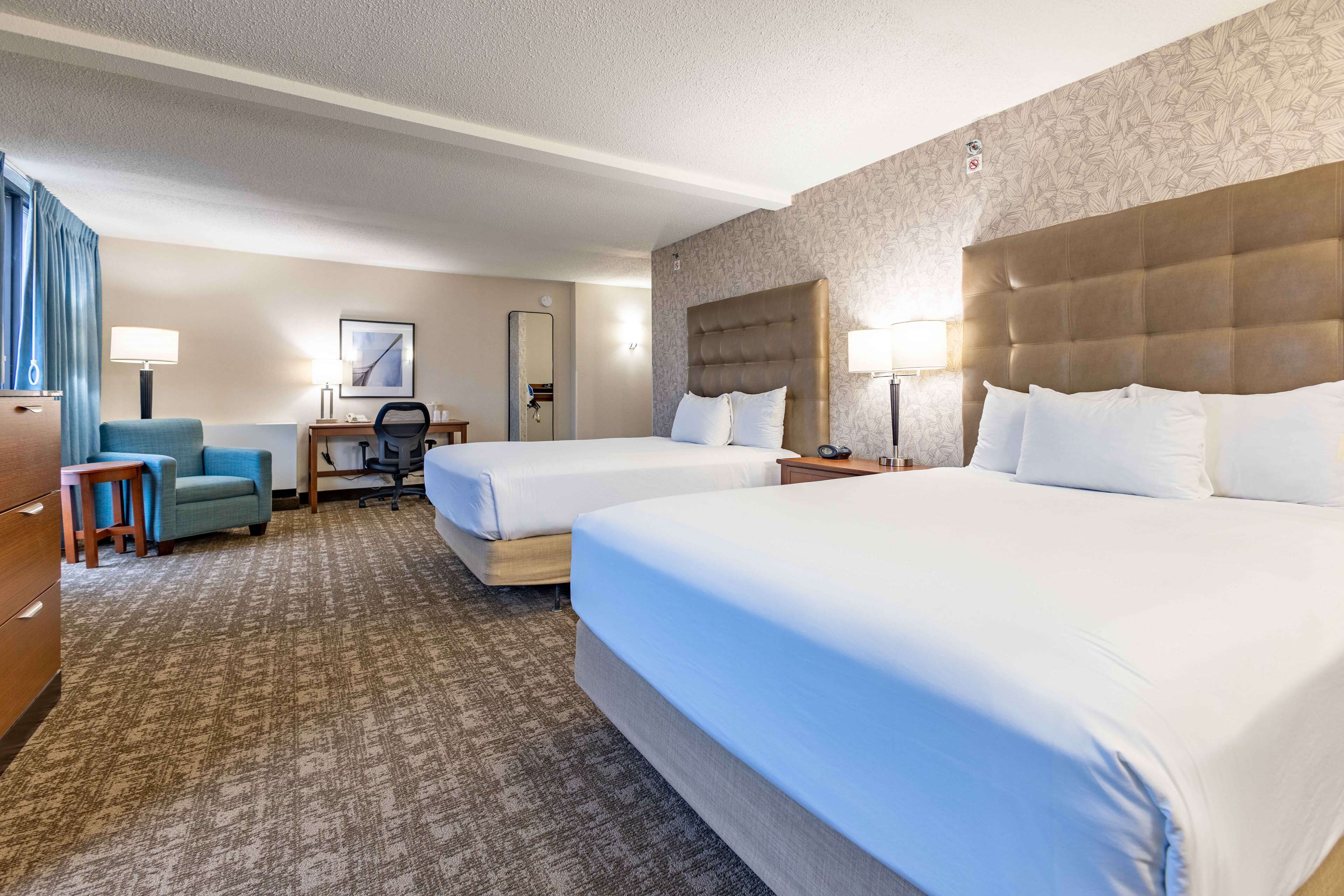 desk, blackout curtains, iron/ironing board, free cots/infant beds