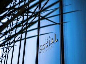 A building facade with a sign that reads "The Social Bar & Bistro."