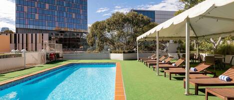 Outdoor pool, open 6:00 AM to 9:00 PM, sun loungers