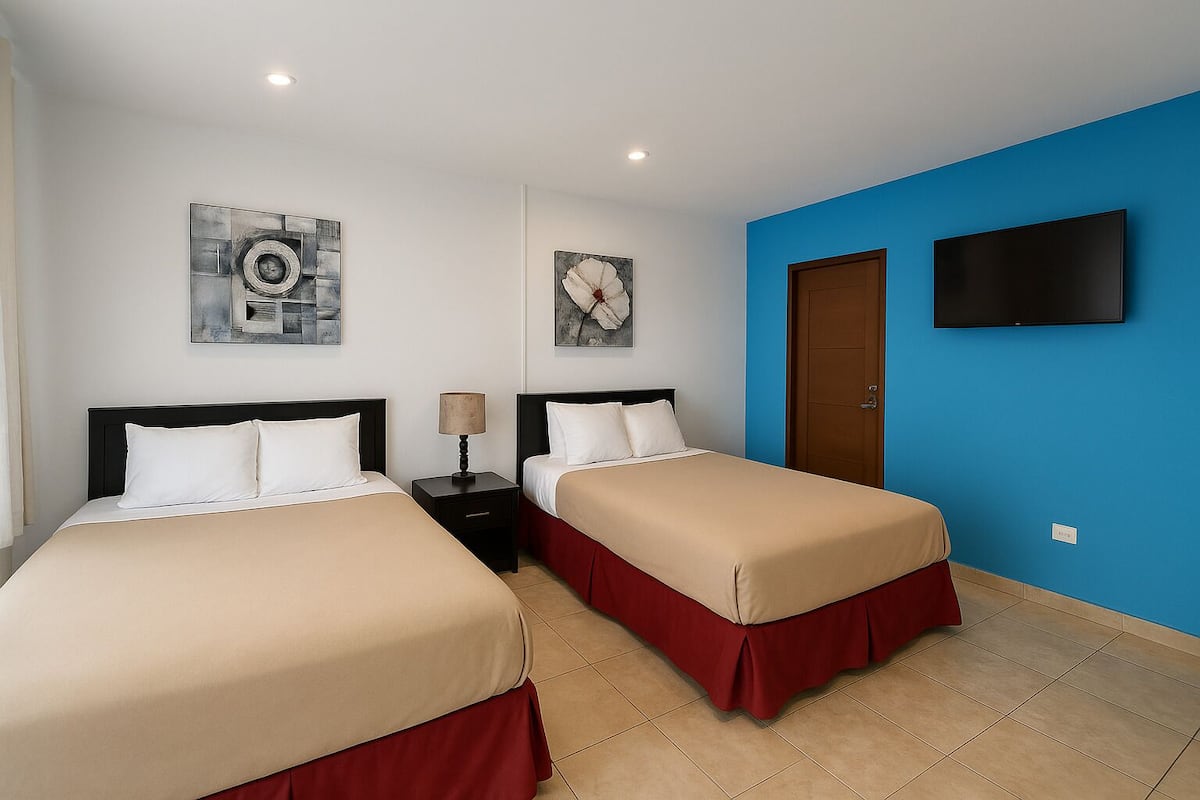 Standard Double Room, 2 Double Beds | In-room safe, individually decorated, desk, blackout drapes