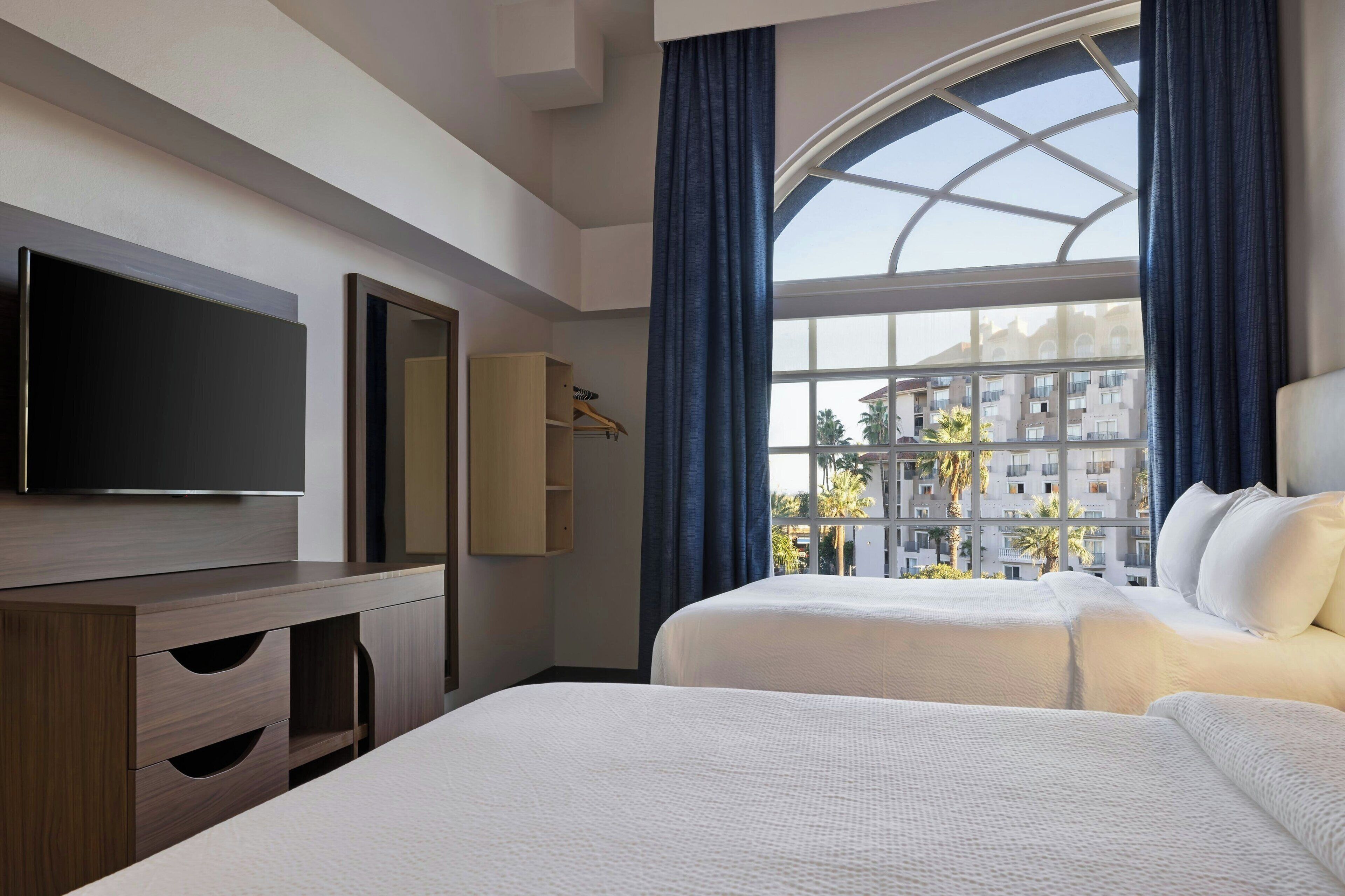 Premium bedding, pillow-top beds, in-room safe, blackout curtains