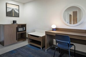 Luxe beddengoed, pillowtop-bedden, een kluis op de kamer